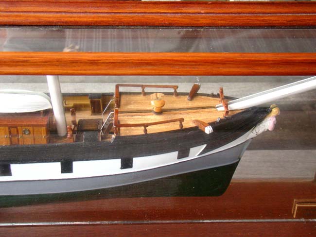 A cased model of the OUTLAPA, a three-masted ship built at Sunderland, England in 1869.